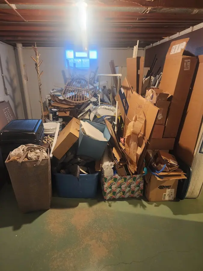 Roll-off dumpster container at job site for Cleanout Dumpster Rental in Paw Paw